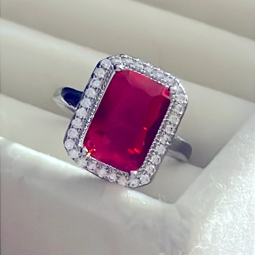 Faux ruby and diamond silver tone ring